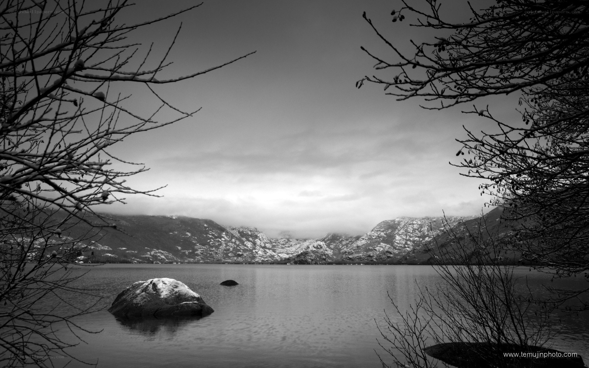 Snowy lake with mountains