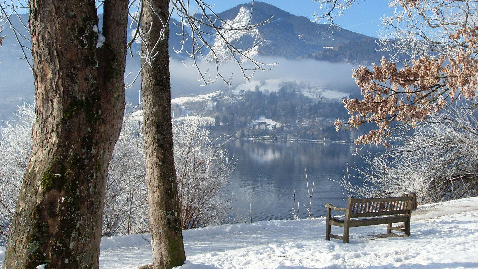 Snowy lake with mountains