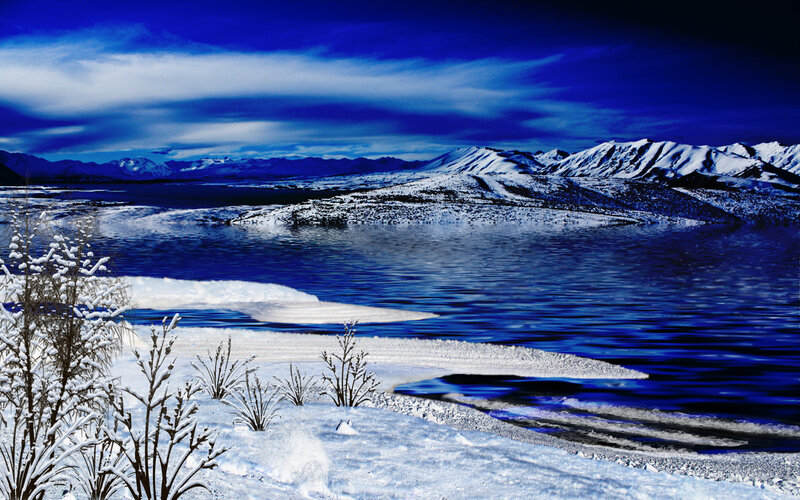Snowy lake with mountains
