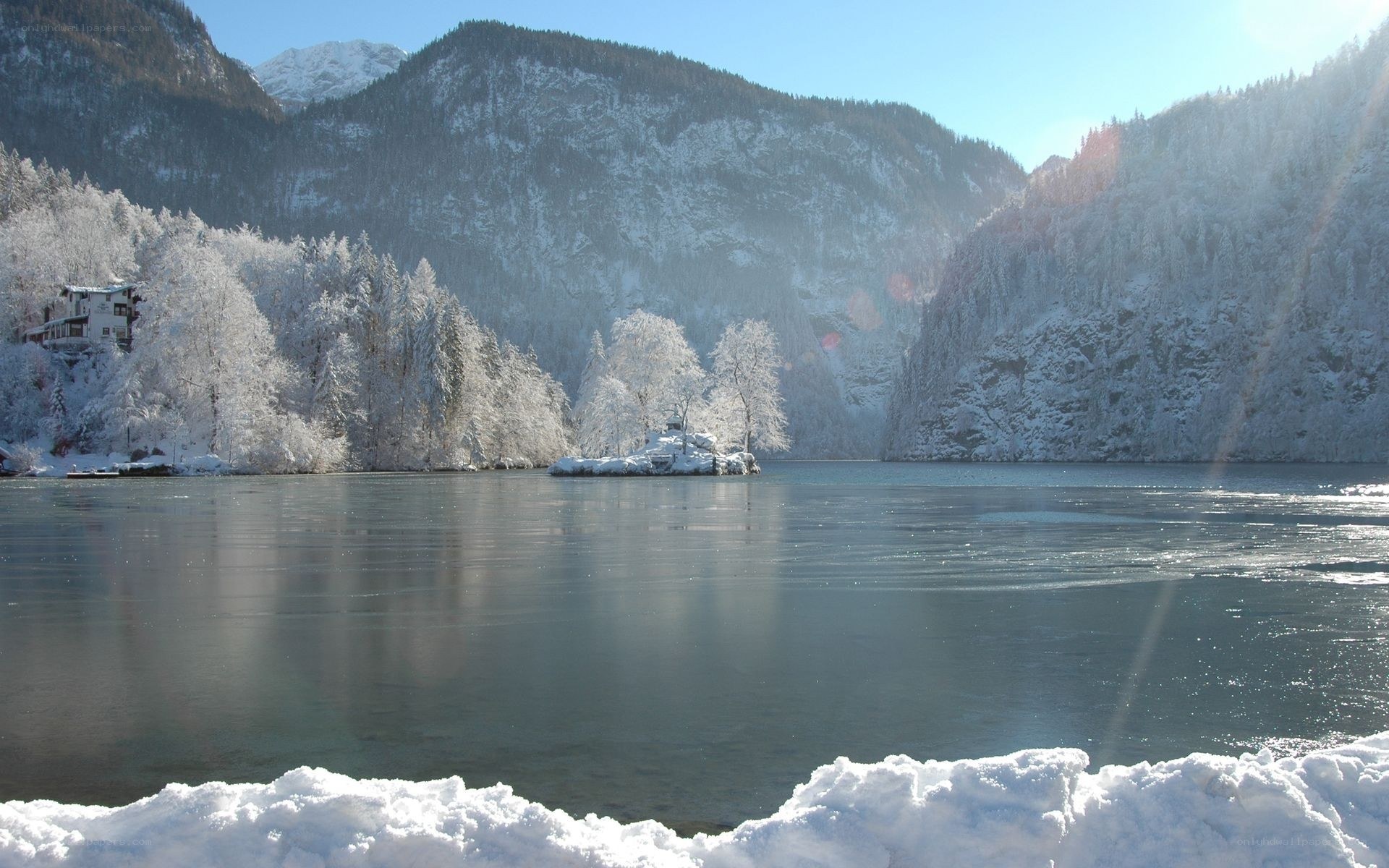 Snowy lake with mountains
