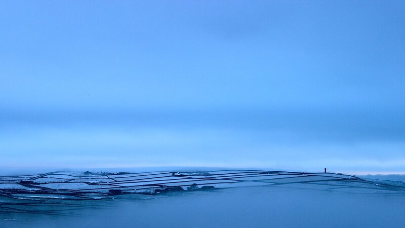 Snowy landscape at dawn