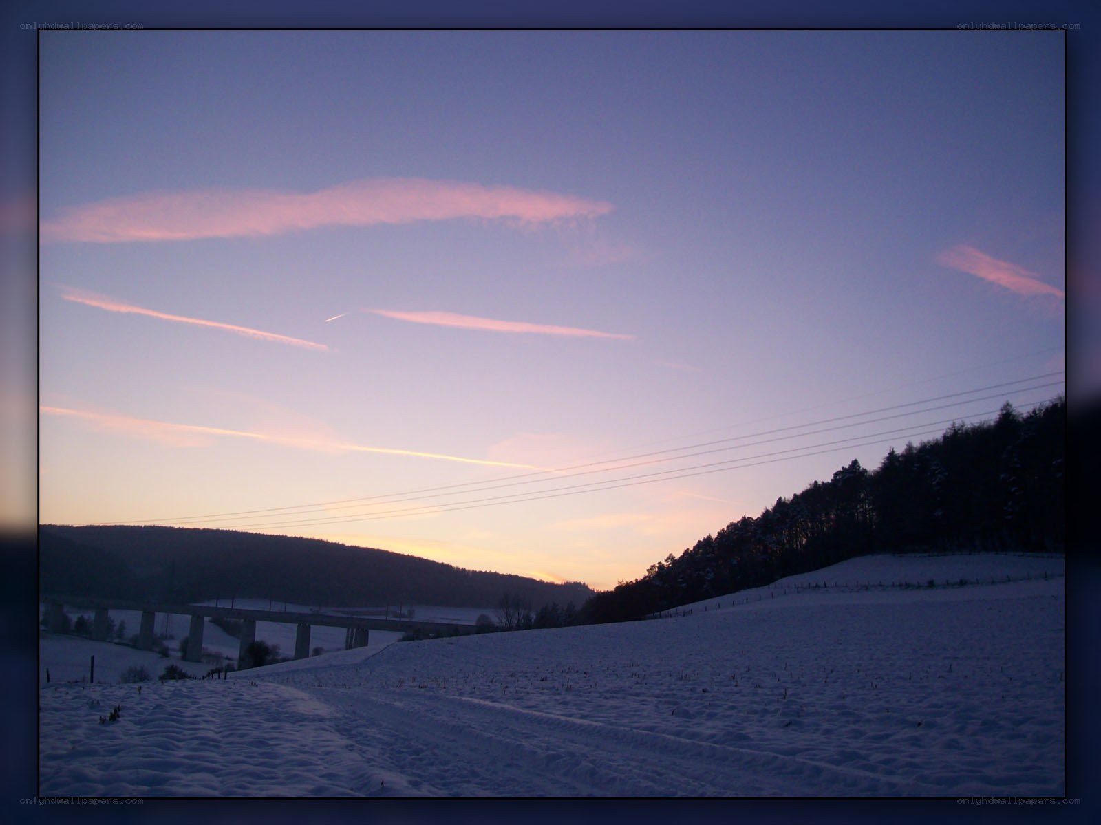 Snowy landscape at dusk