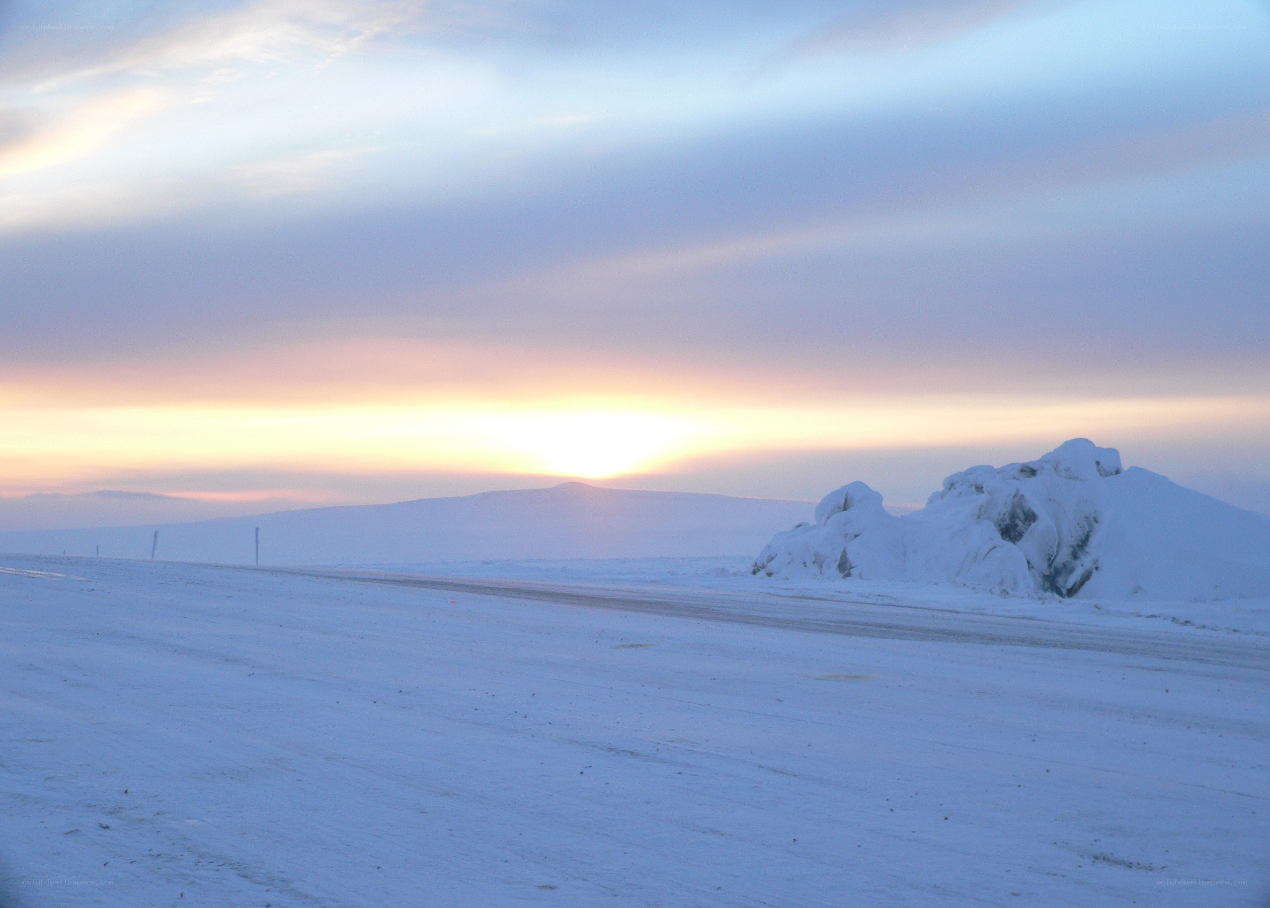 Snowy landscape at sunset