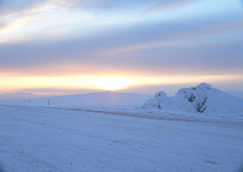 Snowy landscape at sunset