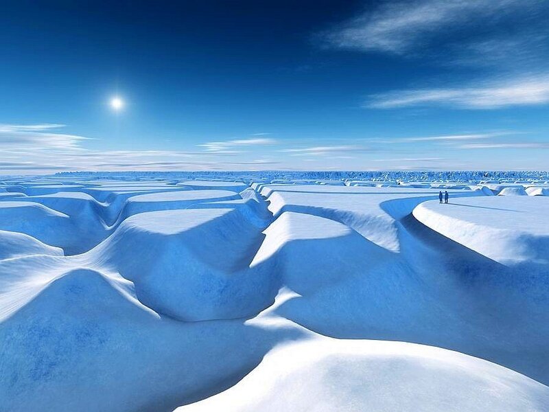 Snowy landscape under blue sky