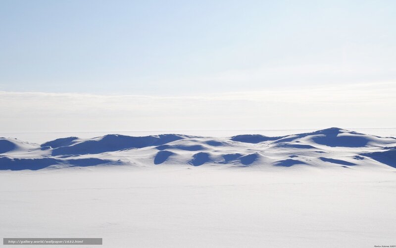 Snowy landscape under clear sky