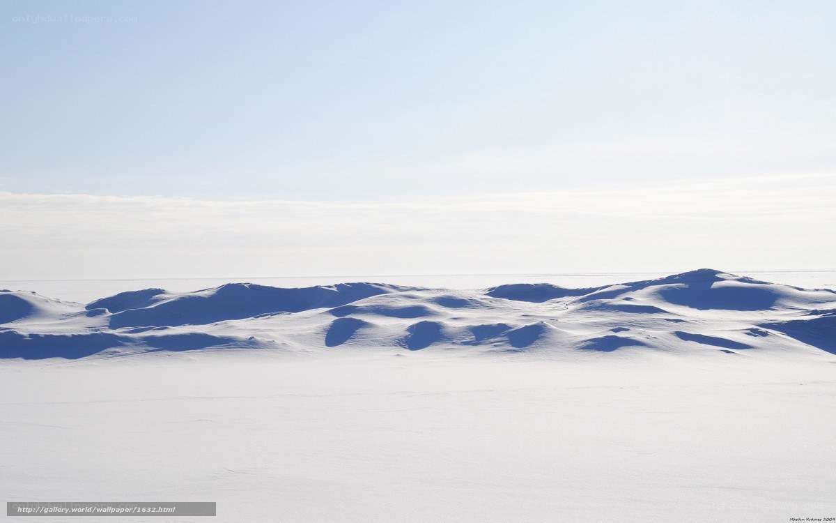 Snowy landscape under clear sky