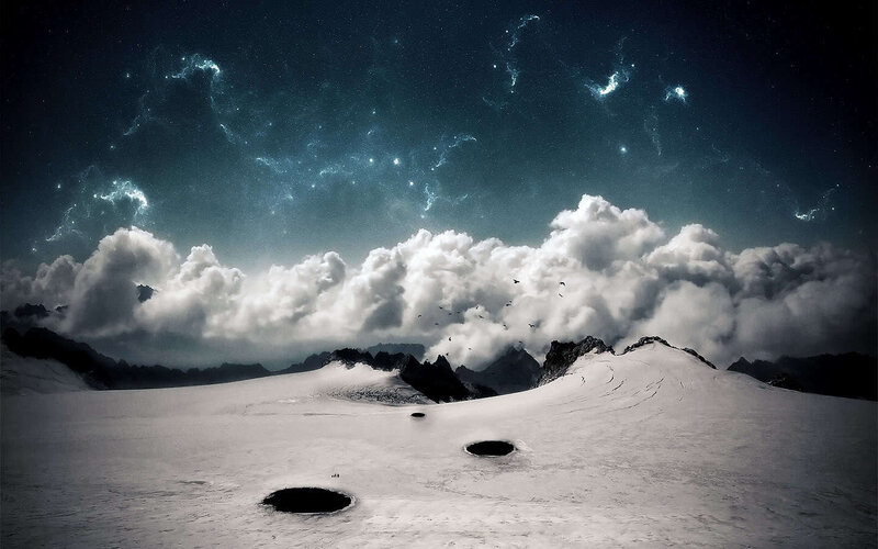 snowy landscape under starry sky