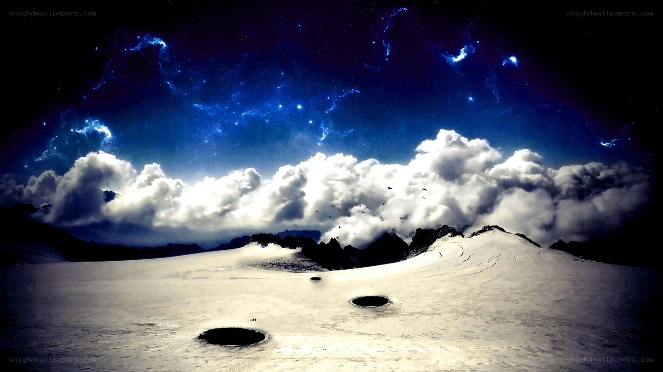 Snowy landscape under starry sky