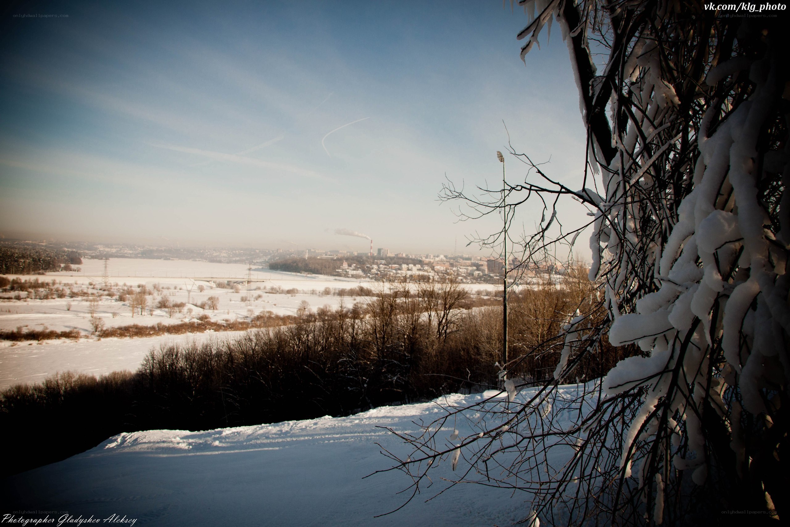 Snowy landscape with city view