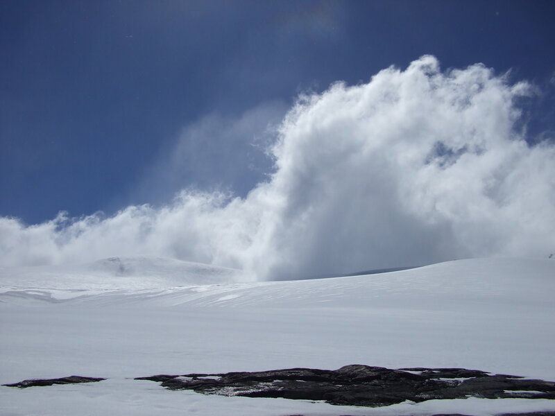 Snowy landscape with clouds