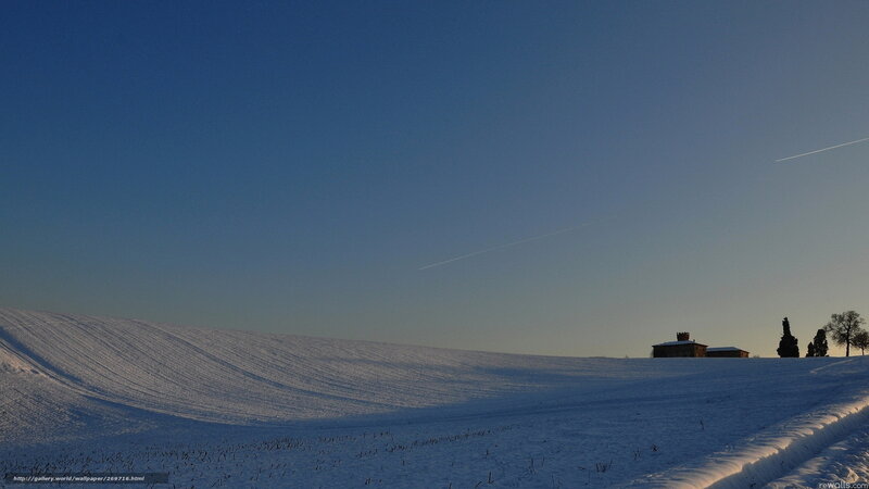 Snowy landscape with farmhouse