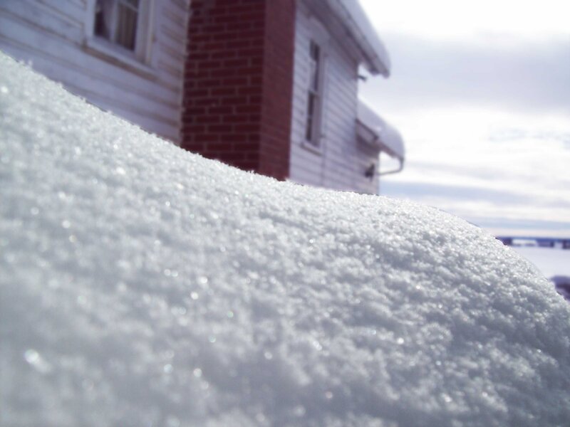 Snowy landscape with house