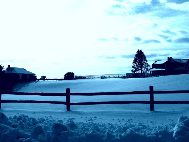 Snowy landscape with houses
