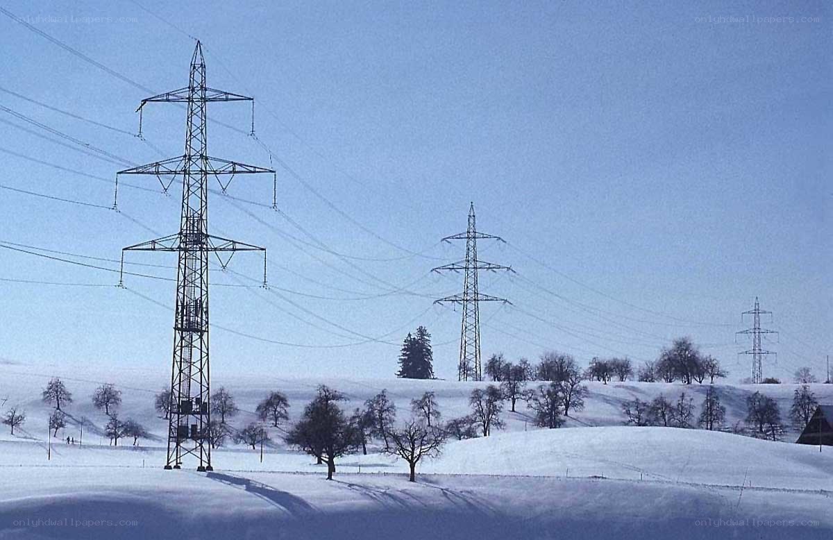 Snowy landscape with power lines