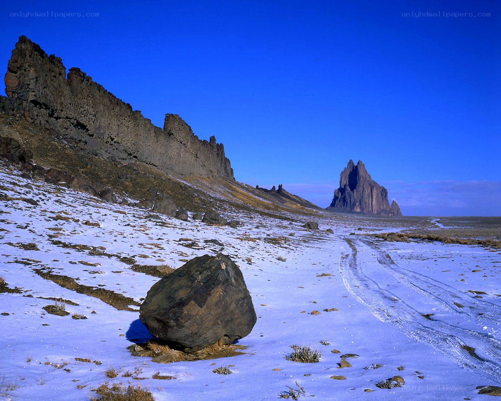 Snowy landscape with rock formations