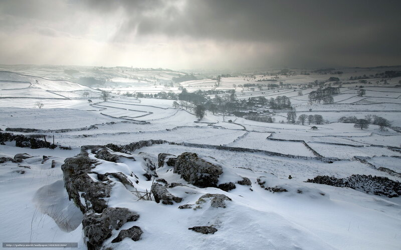 Snowy landscape with stone walls