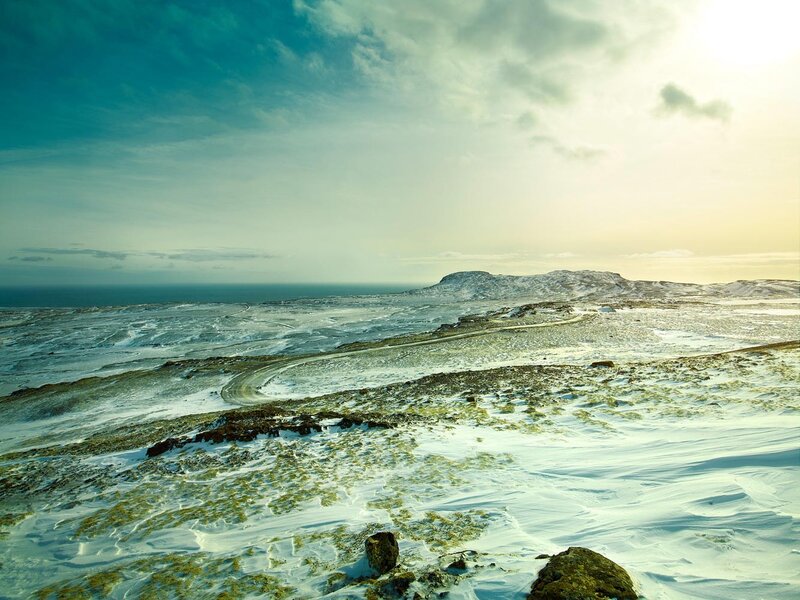 Snowy landscape with winding road