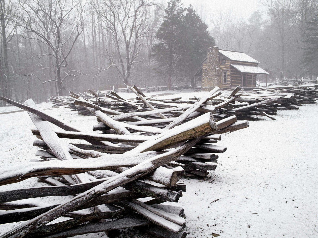 Snowy log cabin in winter