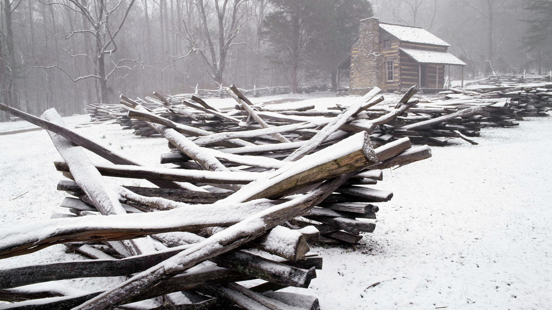 Snowy log cabin in winter