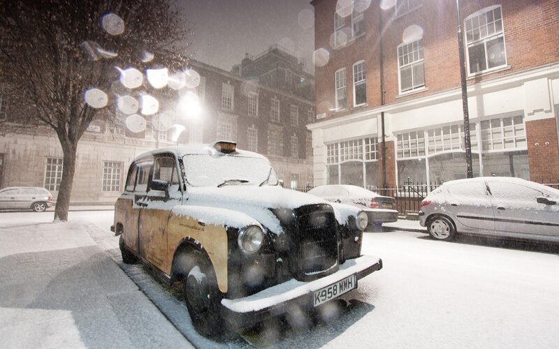Snowy London taxi scene
