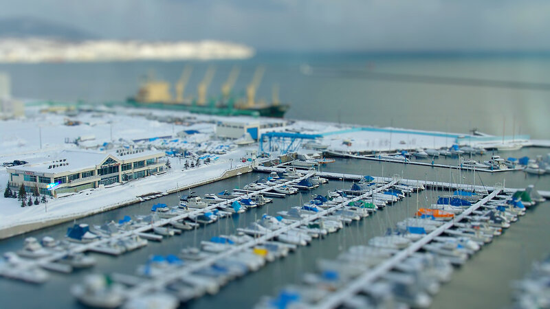 snowy marina with boats