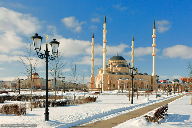 Snowy mosque with minarets