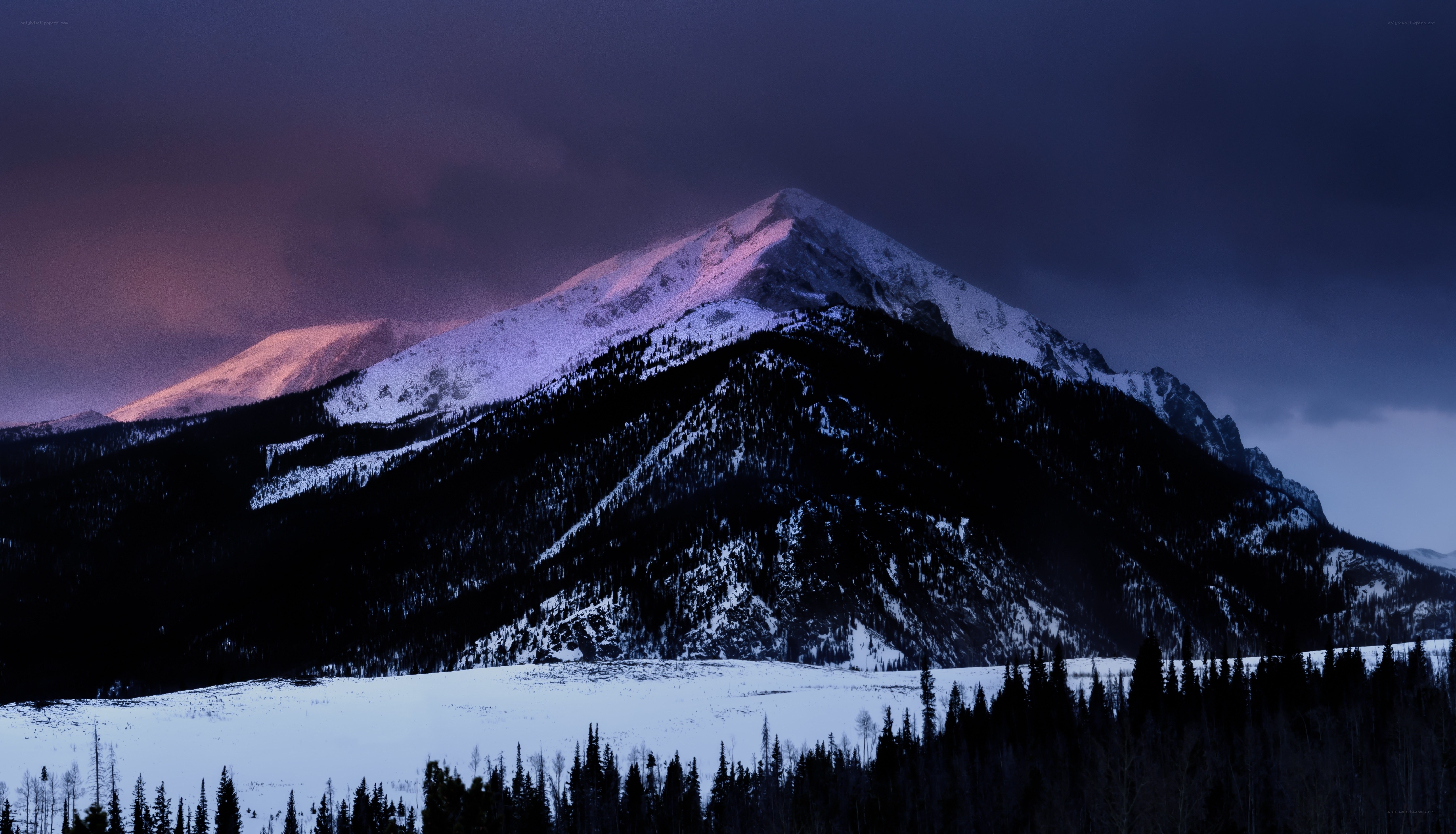 Snowy mountain at dusk