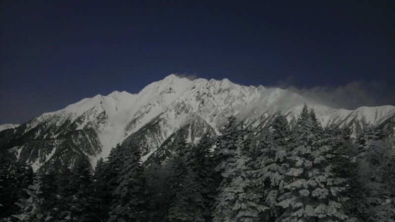 snowy mountain at night
