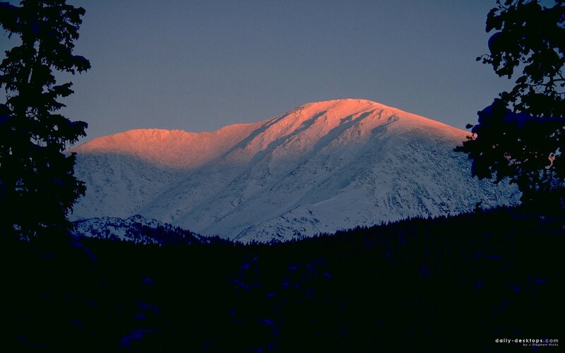 snowy mountain at sunrise
