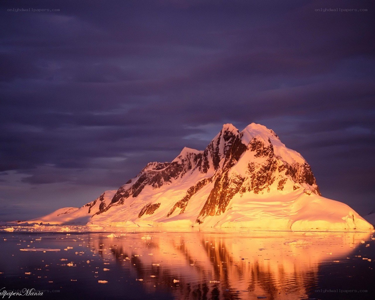 Snowy mountain at sunset