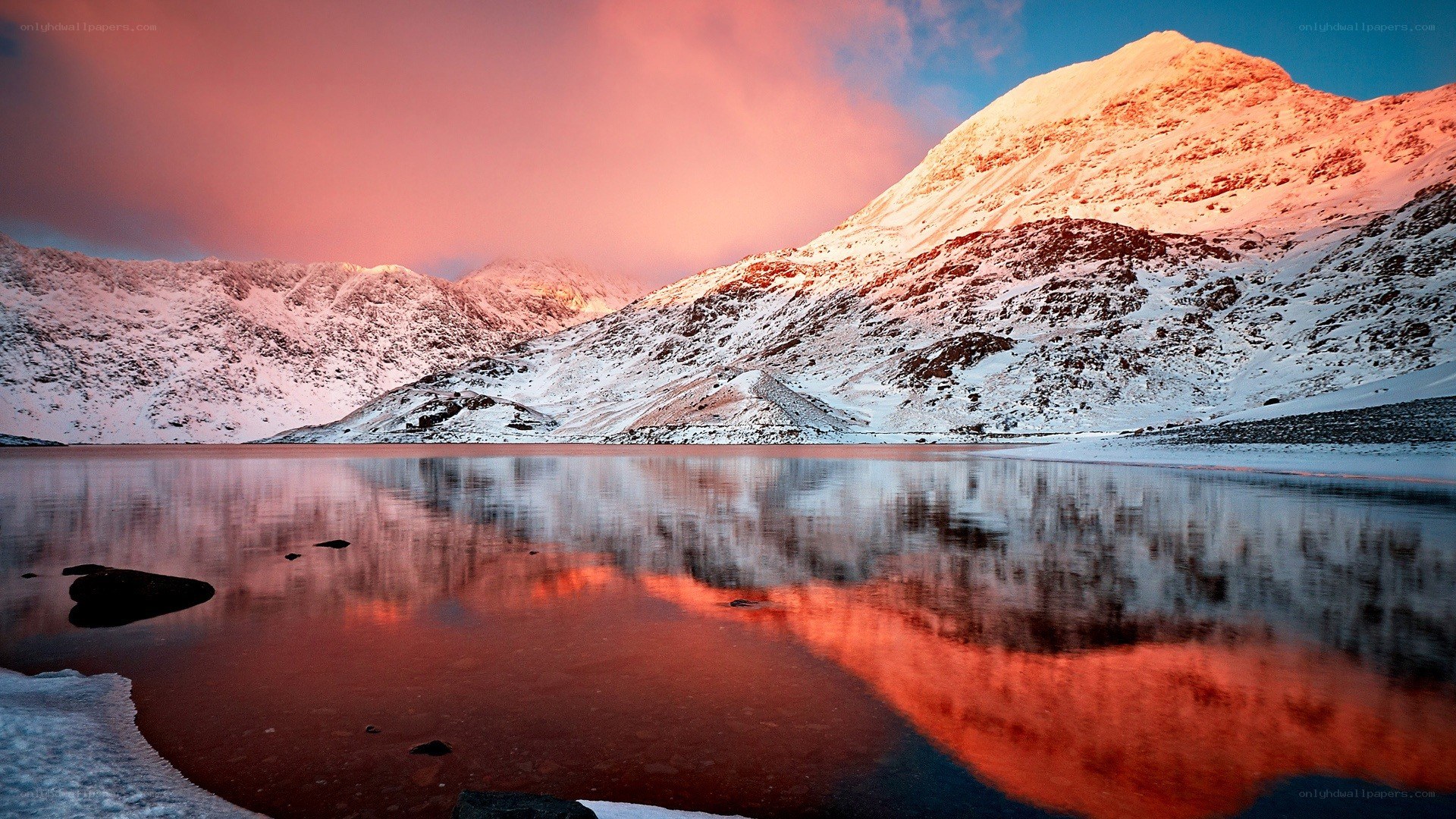 Snowy mountain at sunset