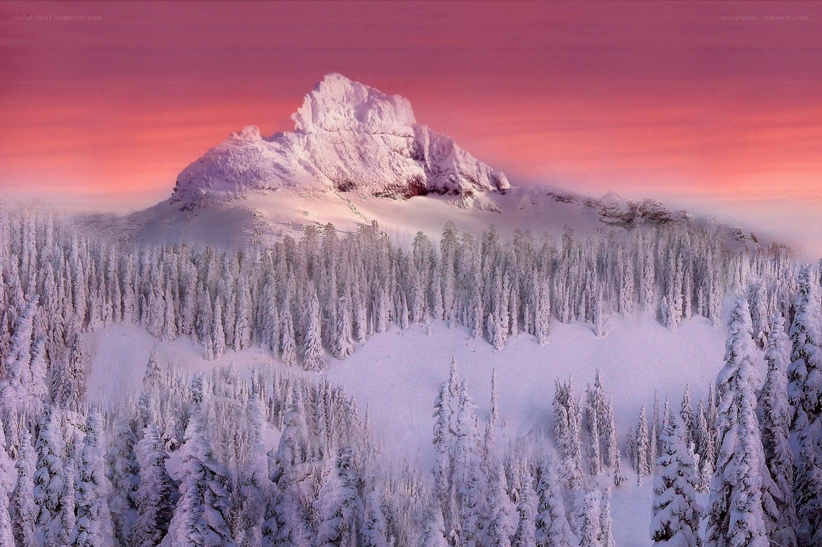 Snowy mountain at sunset