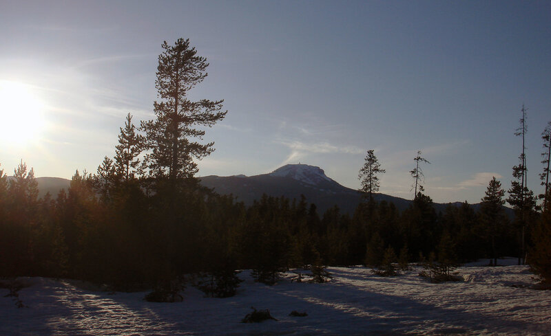 Snowy mountain at sunset