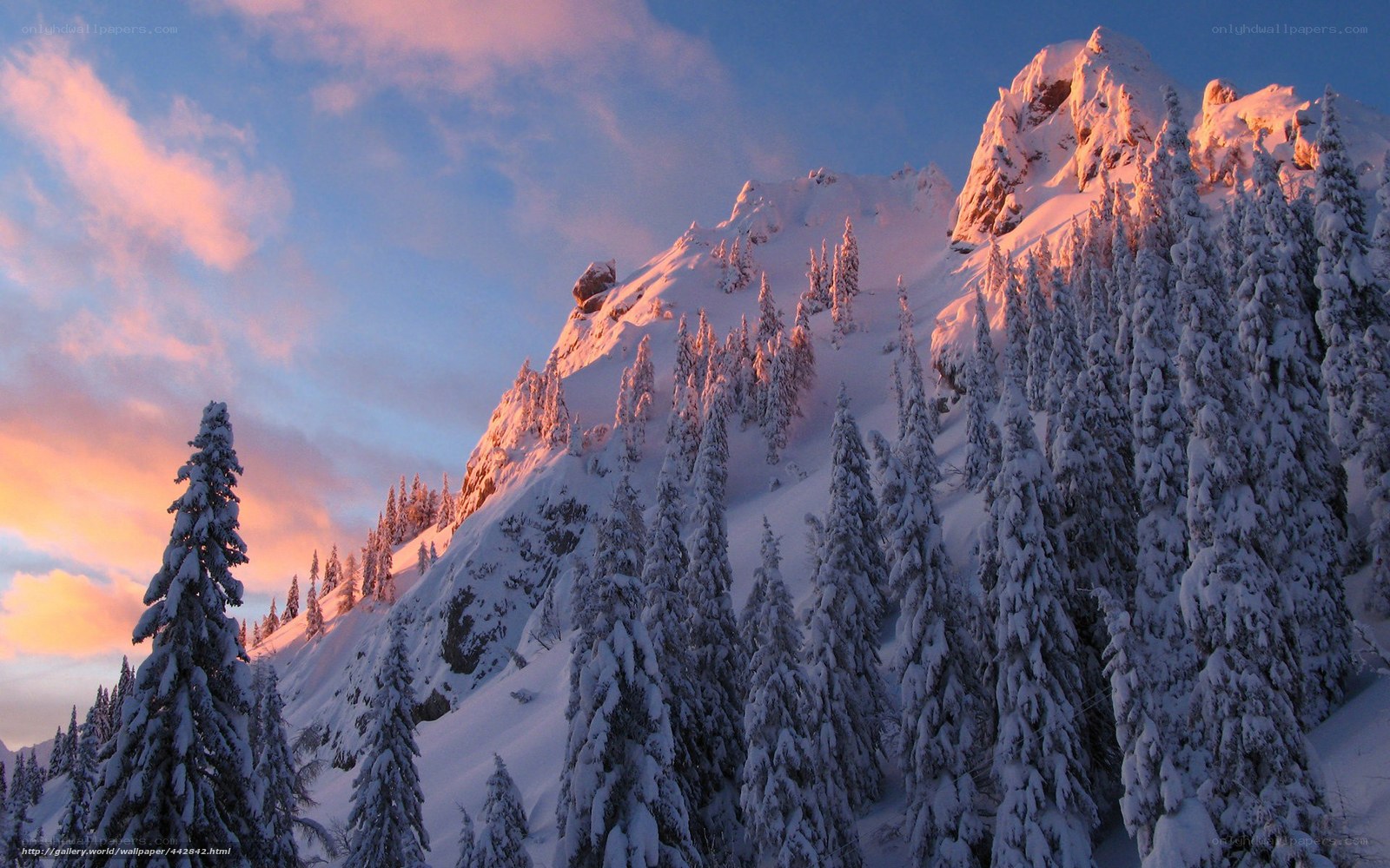 Snowy mountain at sunset