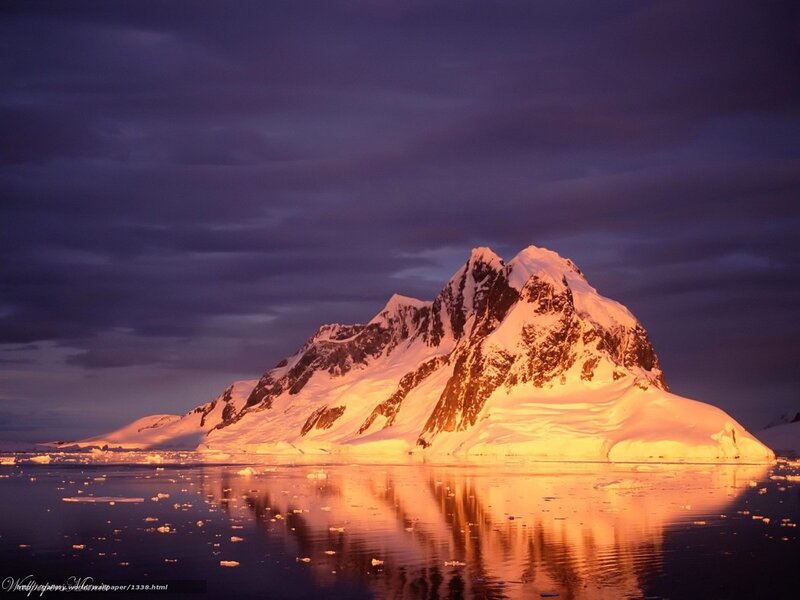 Snowy mountain at sunset