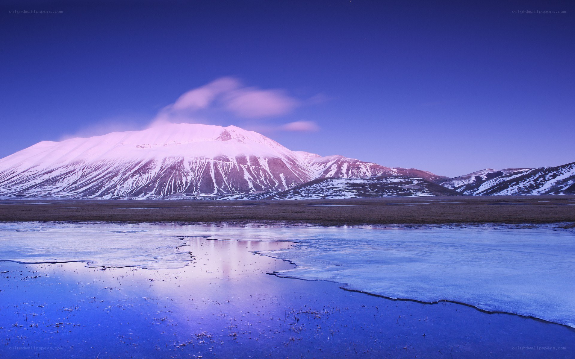 Snowy mountain at twilight
