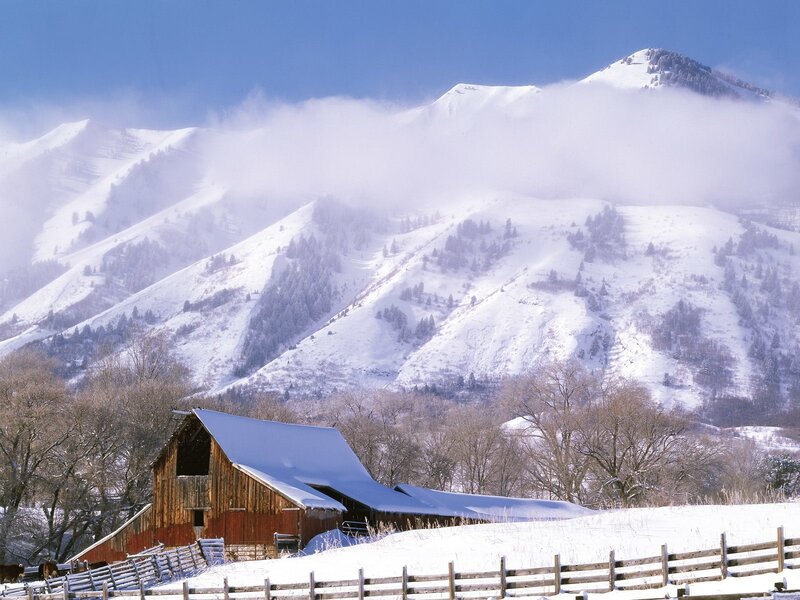 Snowy mountain barn scene