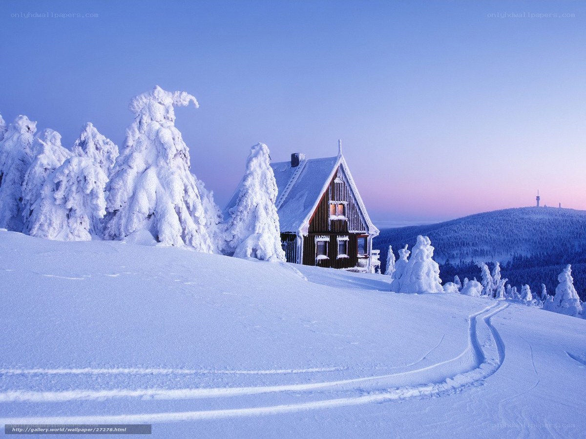 Snowy mountain cabin at dawn