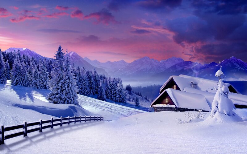 Snowy mountain cabin at dusk