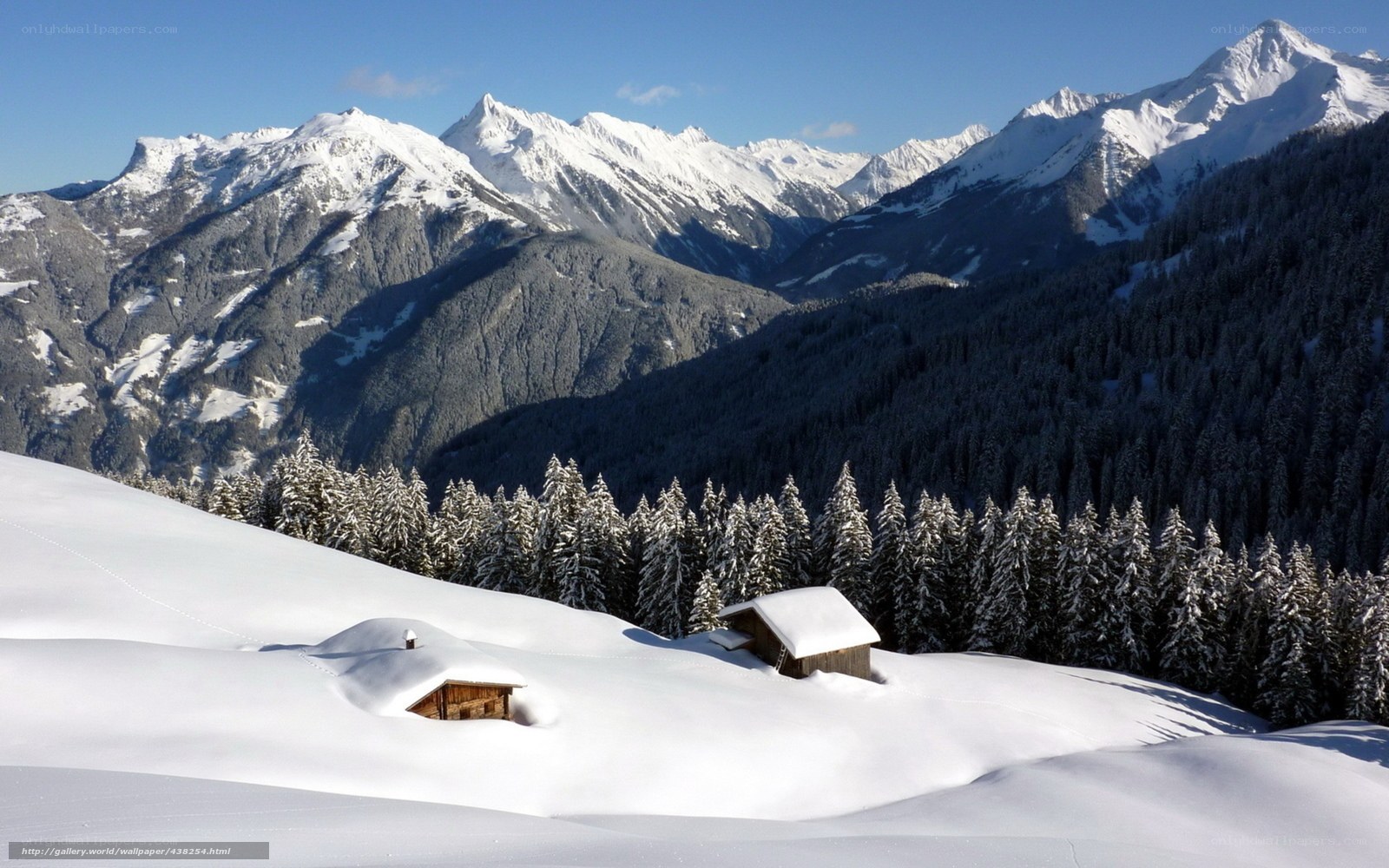Snowy mountain cabin landscape