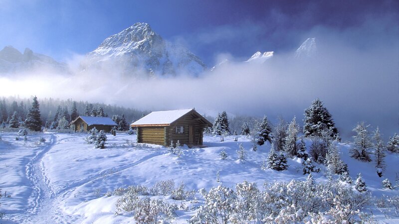 Snowy mountain cabin scene