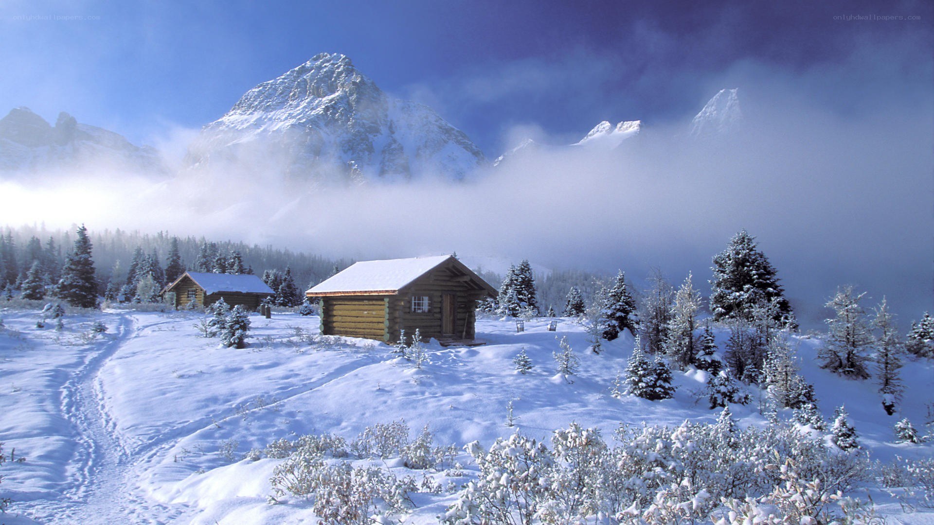 Snowy mountain cabin scene