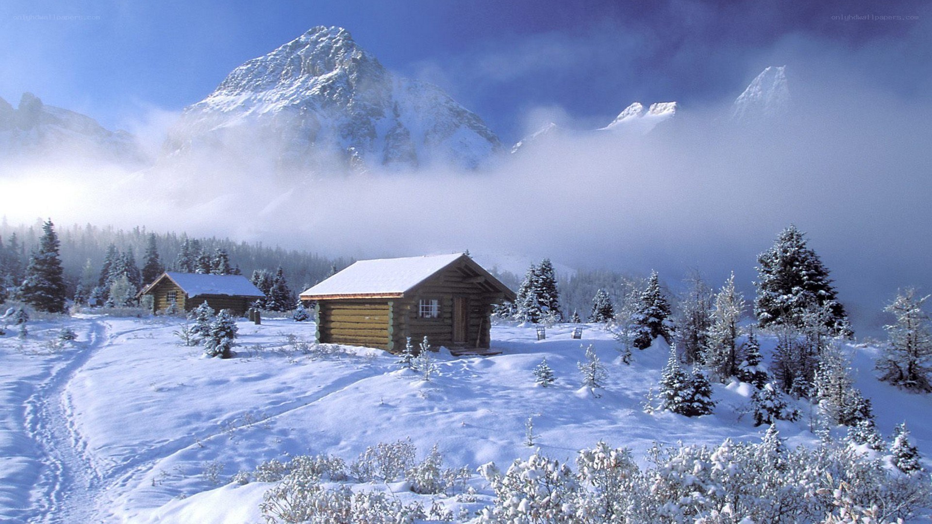 Snowy mountain cabin scene