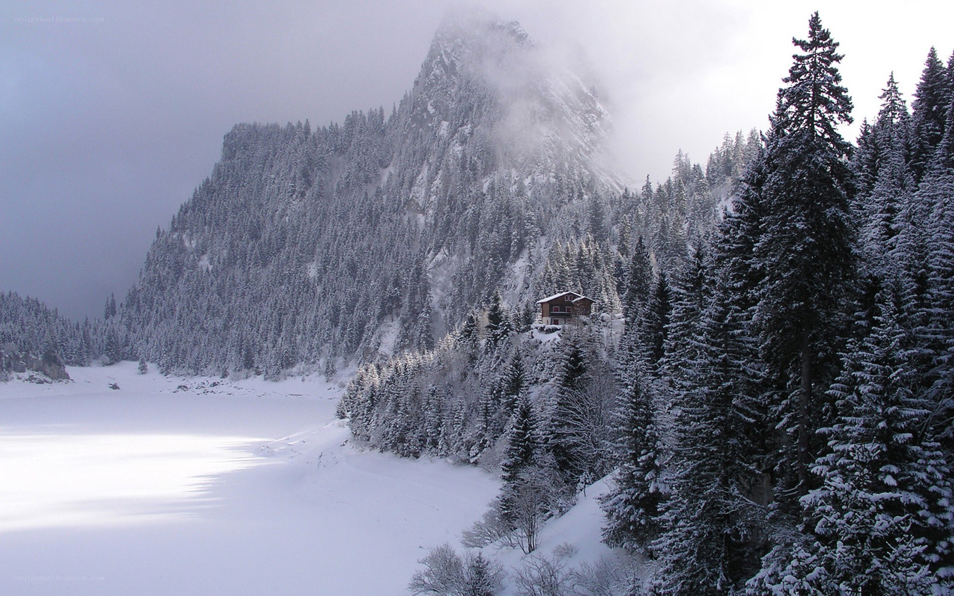 Snowy mountain cabin scene