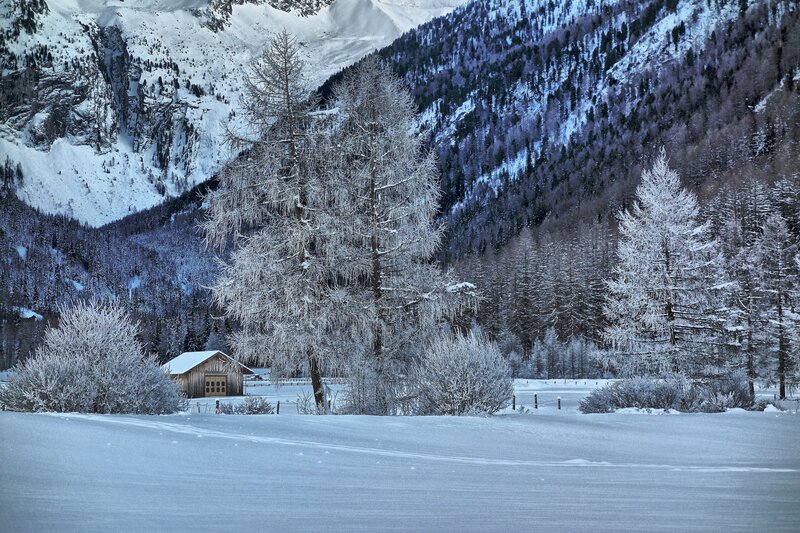Snowy mountain cabin scene