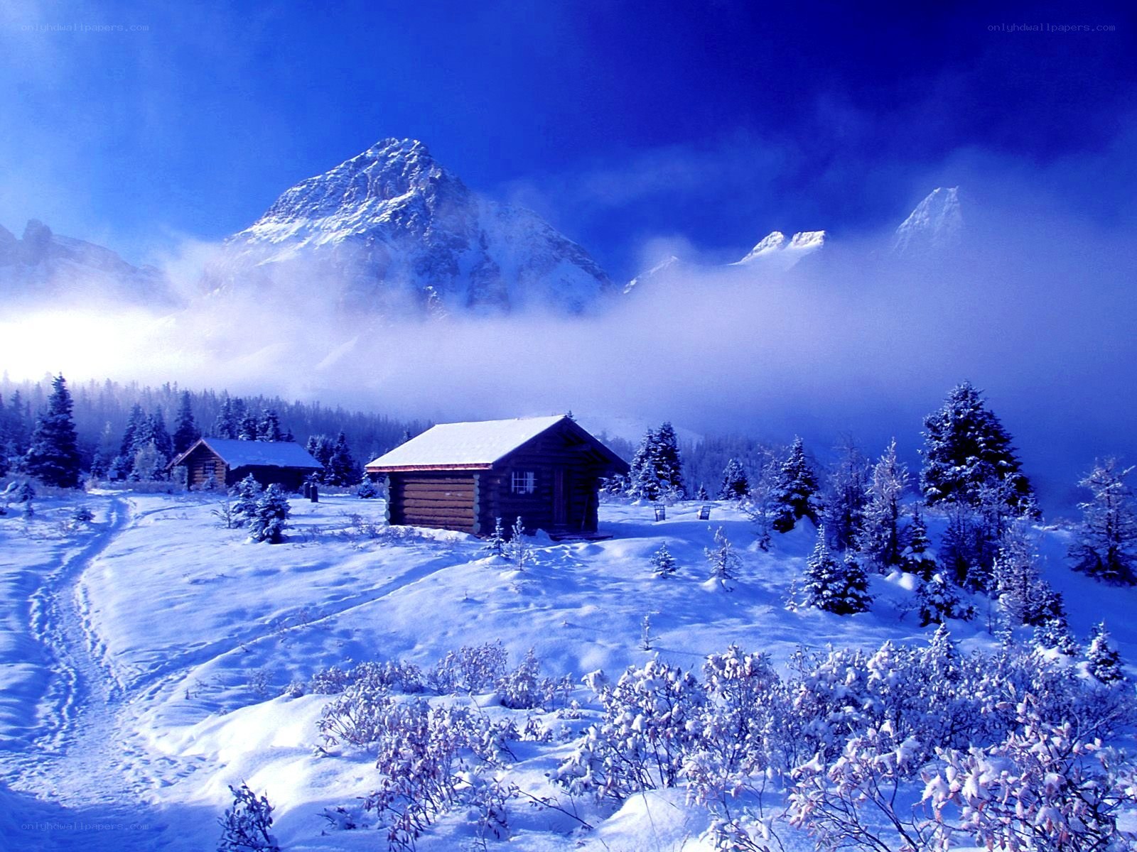 Snowy mountain cabin scene