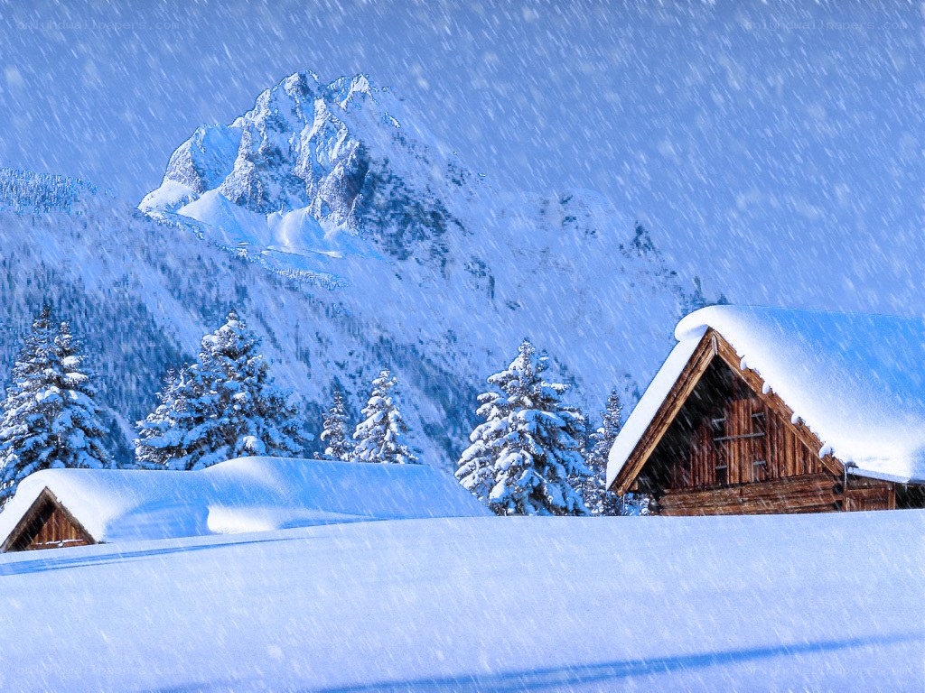 Snowy mountain cabin scene