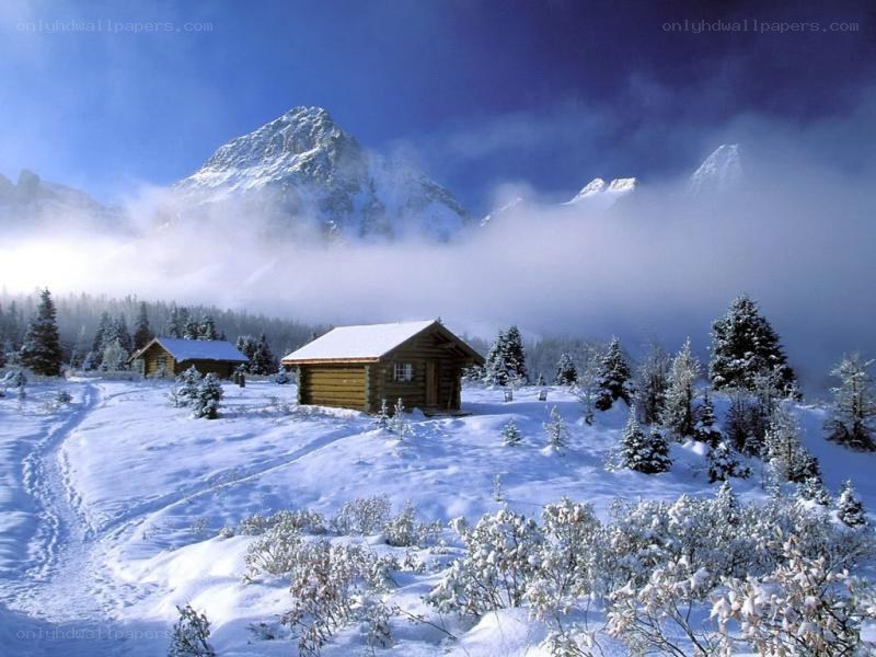 Snowy mountain cabin scene