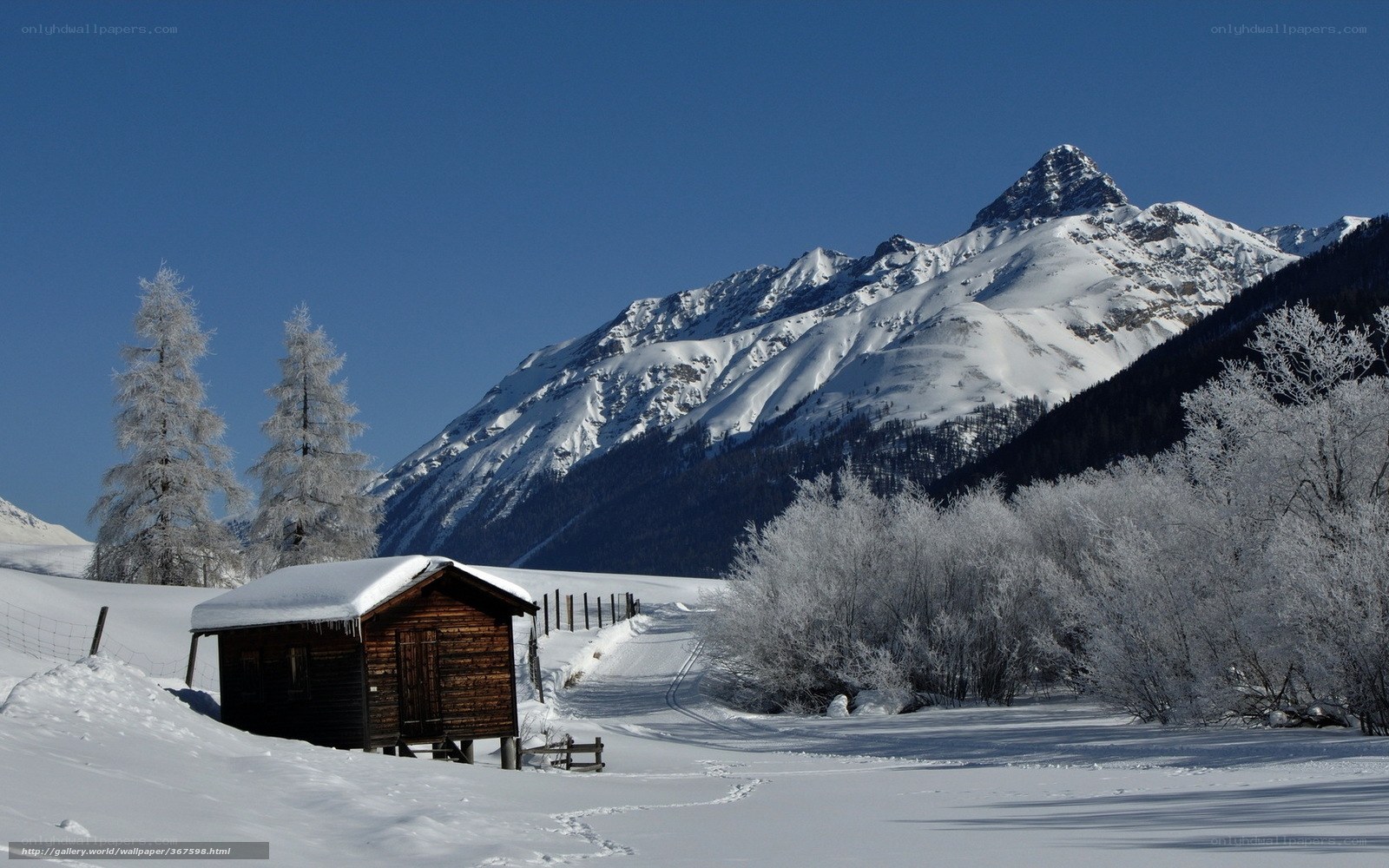 Snowy mountain cabin scene